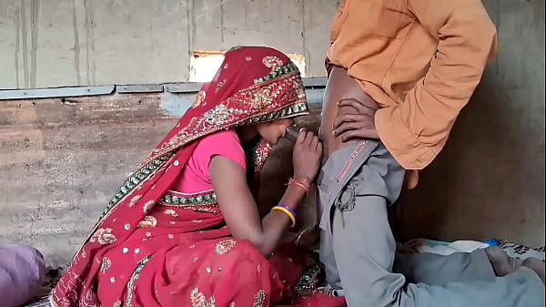 Desi Bhabhi Wears Red Saree During Intimate Scene