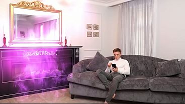 Two Pink Dolls Sitting on a Sofa and One Facial